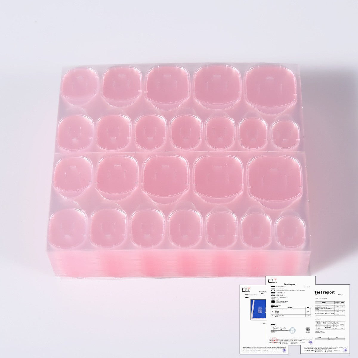 Pink press-on nail tips set in clear case tray