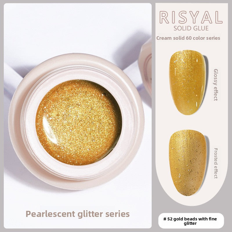 Gold glitter solid gel polish in a round jar, fine sparkles for a glossy nail finish
