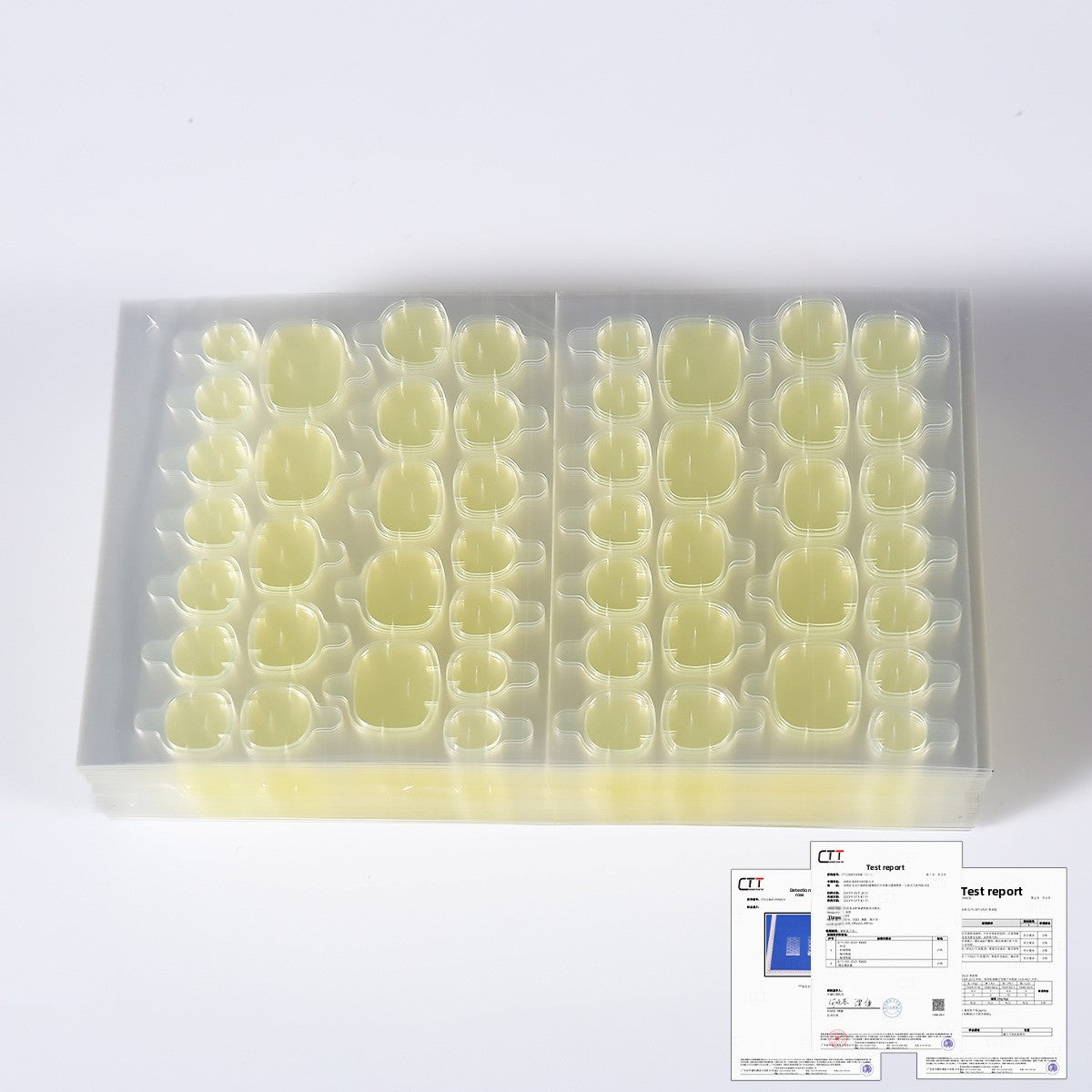 Nail gel glue kit nail tips (pale yellow) in plastic organizer with compartments