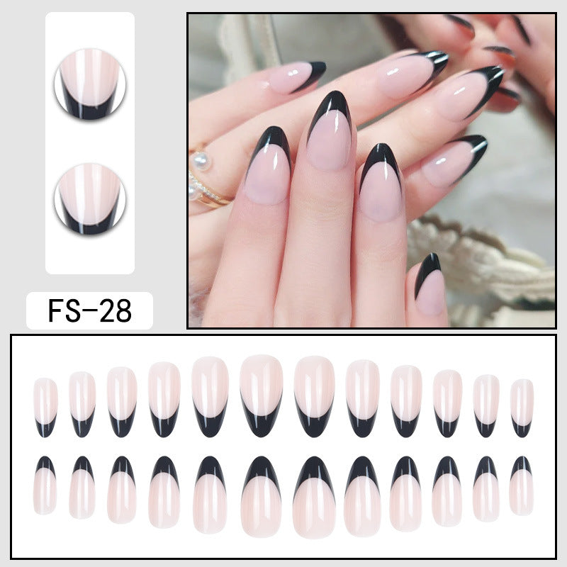 FS-28 nude press-on nails with black pointed French tips, glossy