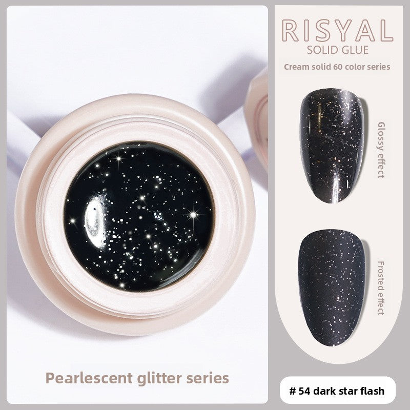 Dark star flash glitter solid gel polish in a round jar, black with bright star-like specks