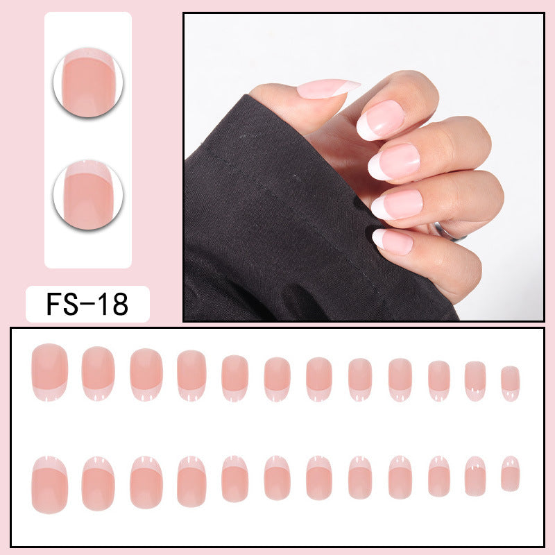 FS-18 pastel pink press-on nails with white French tips, oval shape set