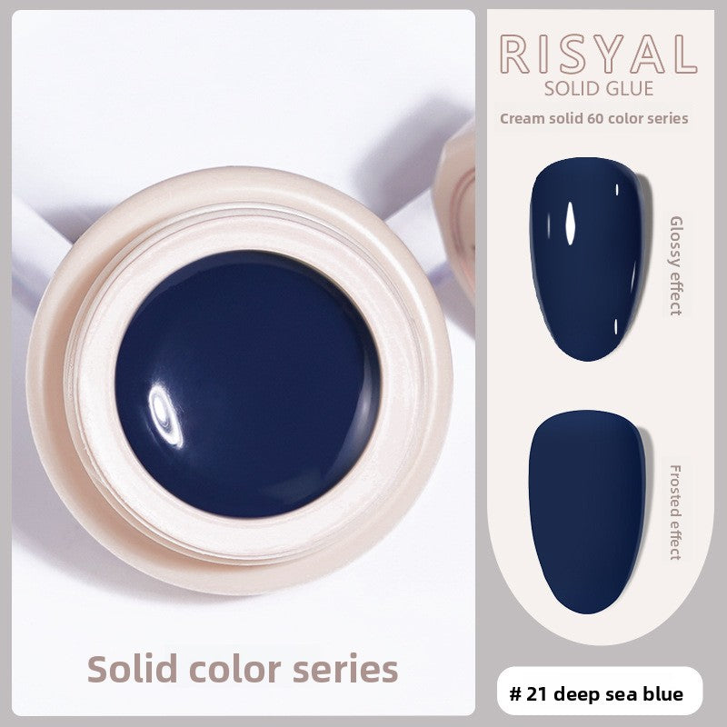 Solid nail polish gel, deep sea blue cream color (#21) in jar with swatch