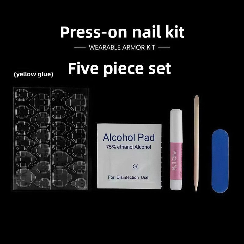 Five-piece press-on nail kit items: alcohol pad, glue, applicator, blue nail tips, template